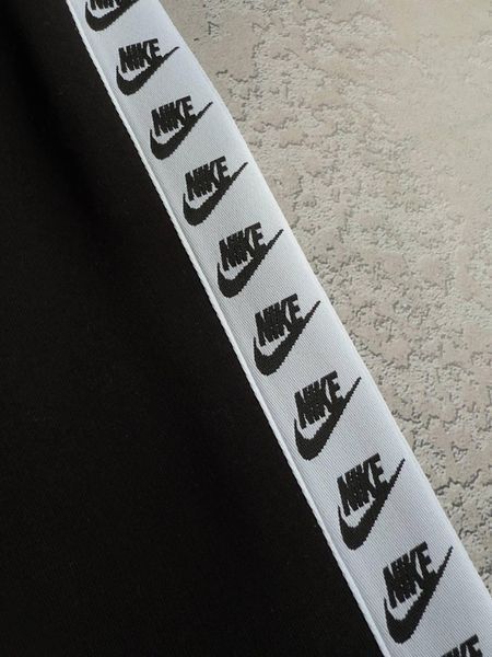Чоловічі зимові спортивні штани Nike з лампасами чорні Хар-700 фото