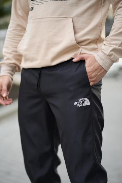 Чоловічі спортивні штани The North Face з плащової тканини чорні Брюки ТНФ Intr-1615452987 фото