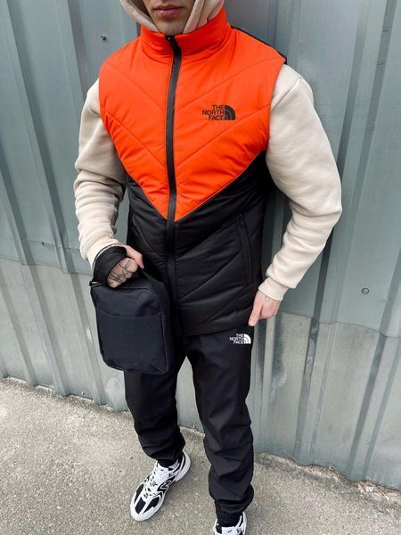 Мужская жилетка The North Face черная с оранжевым без капюшона Безрукавка ТНФ стеганная из плащевки Intr-1620135944 фото