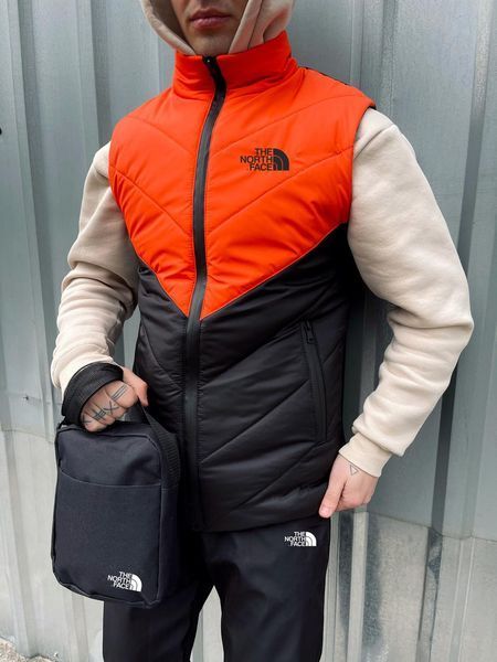 Мужская жилетка The North Face черная с оранжевым без капюшона Безрукавка ТНФ стеганная из плащевки Intr-1620135944 фото