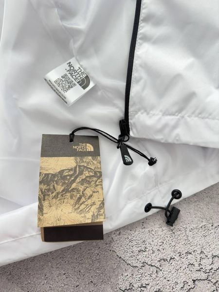 Чоловіча вітрівка The North Face з капюшоном біла Куртка ТНФ весняна Хар-559 фото